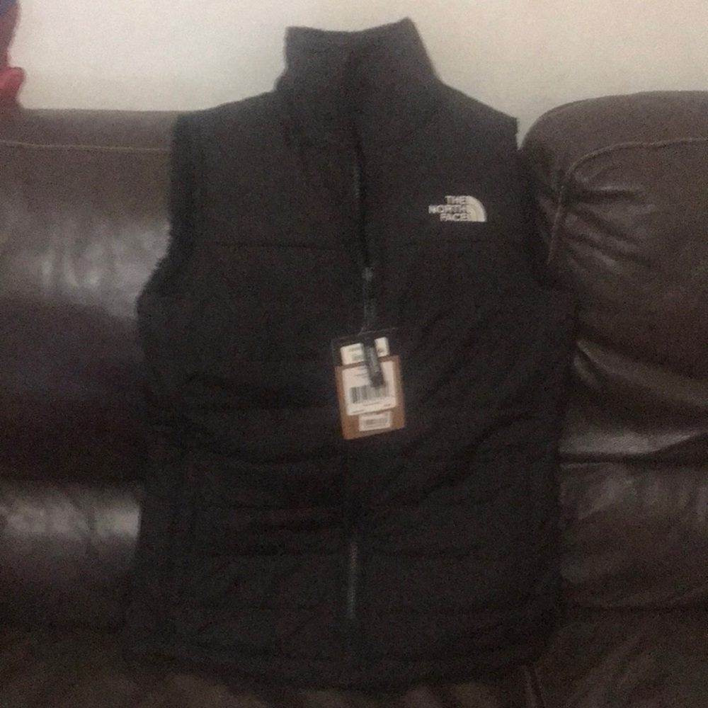 Size Small * The North Face black fur lined puff vest